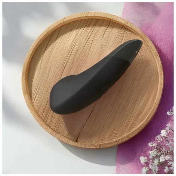 Womanizer Enhance 2-i-1 luftvågsklitorisstimulator + vibrator (svart)